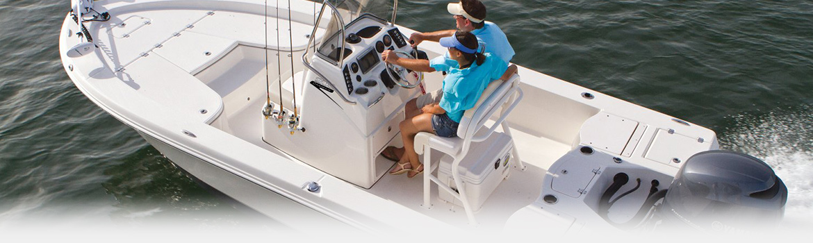 Couple cruising in a featured boat sold at Aquaknox Marine